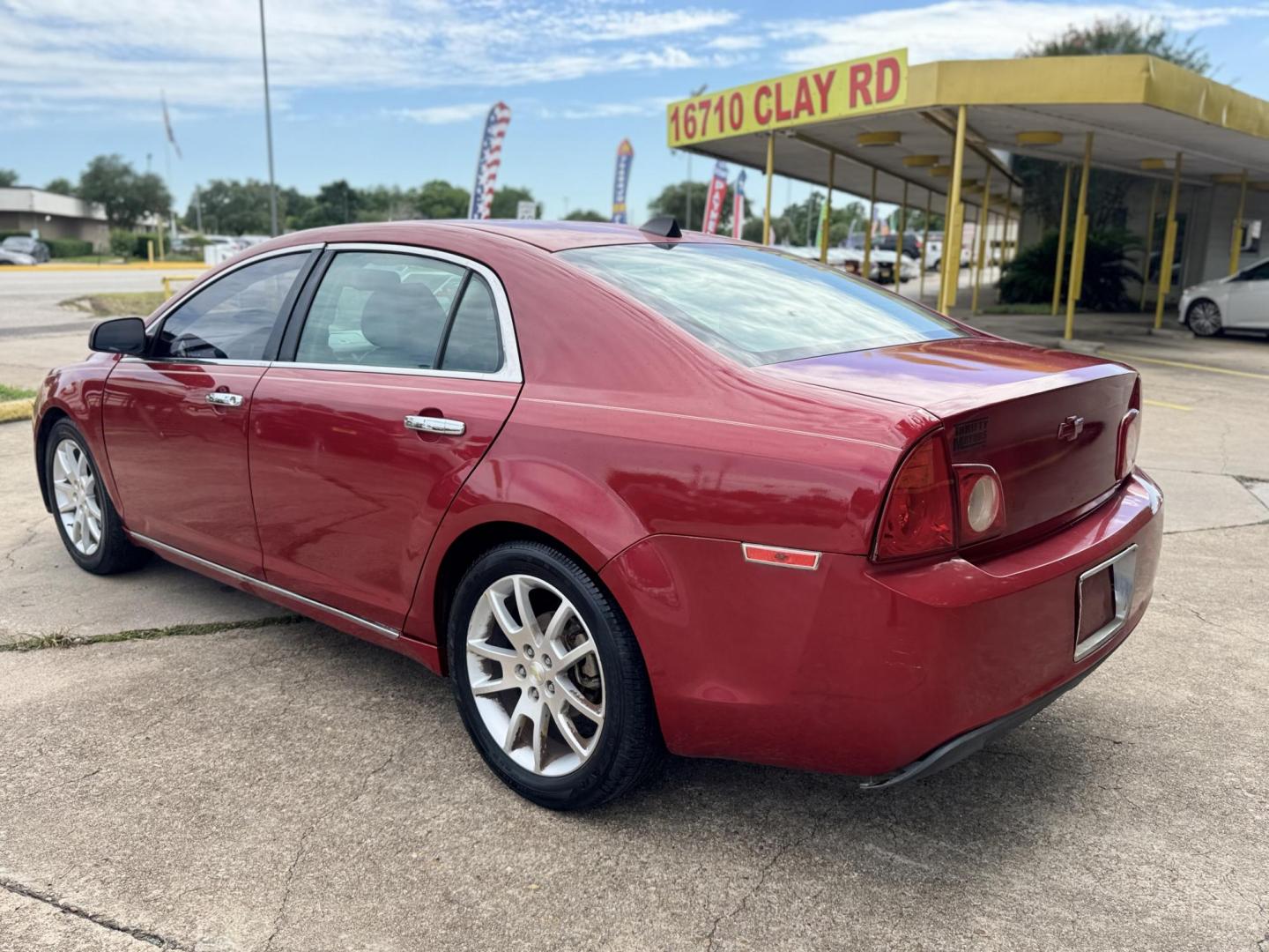 2012 Red /Black Chevrolet Malibu 1LTZ (1G1ZE5E09CF) with an 2.4L L4 DOHC 16V engine, 6-Speed Automatic transmission, located at 16710 Clay Rd., Houston, TX, 77084, (281) 859-7900, 29.834864, -95.656166 - Photo#6