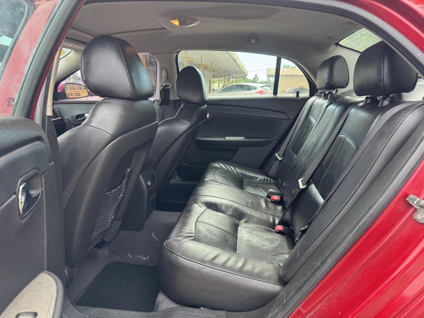 2012 Red /Black Chevrolet Malibu 1LTZ (1G1ZE5E09CF) with an 2.4L L4 DOHC 16V engine, 6-Speed Automatic transmission, located at 16710 Clay Rd., Houston, TX, 77084, (281) 859-7900, 29.834864, -95.656166 - Photo#10
