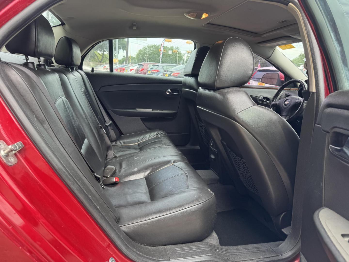 2012 Red /Black Chevrolet Malibu 1LTZ (1G1ZE5E09CF) with an 2.4L L4 DOHC 16V engine, 6-Speed Automatic transmission, located at 16710 Clay Rd., Houston, TX, 77084, (281) 859-7900, 29.834864, -95.656166 - Photo#11