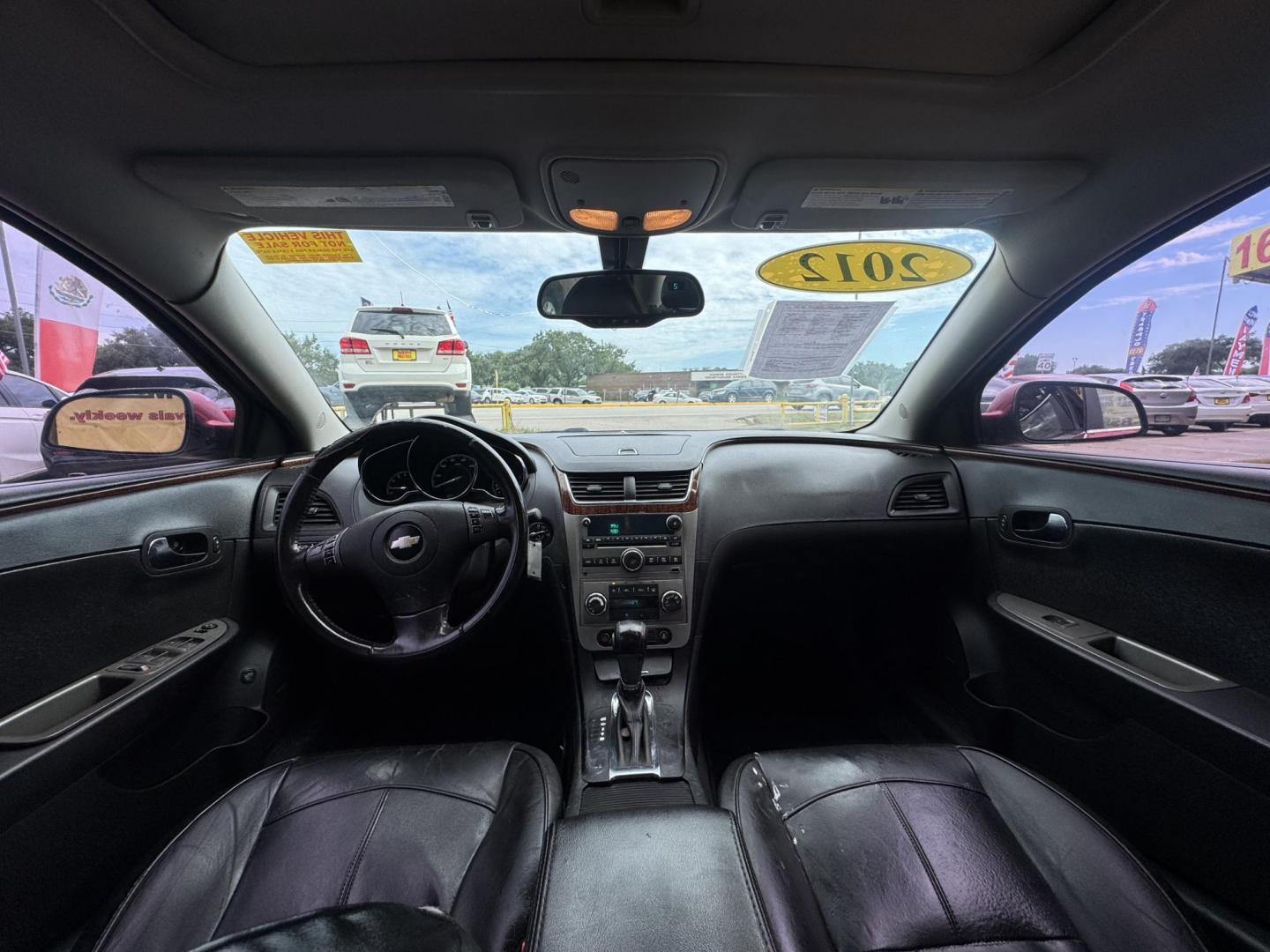 2012 Red /Black Chevrolet Malibu 1LTZ (1G1ZE5E09CF) with an 2.4L L4 DOHC 16V engine, 6-Speed Automatic transmission, located at 16710 Clay Rd., Houston, TX, 77084, (281) 859-7900, 29.834864, -95.656166 - Photo#12
