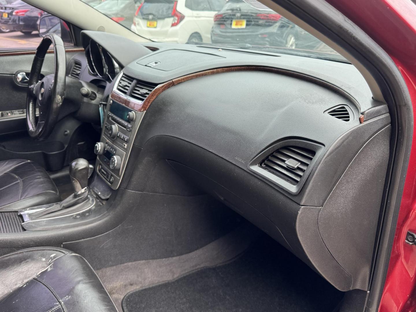 2012 Red /Black Chevrolet Malibu 1LTZ (1G1ZE5E09CF) with an 2.4L L4 DOHC 16V engine, 6-Speed Automatic transmission, located at 16710 Clay Rd., Houston, TX, 77084, (281) 859-7900, 29.834864, -95.656166 - Photo#14