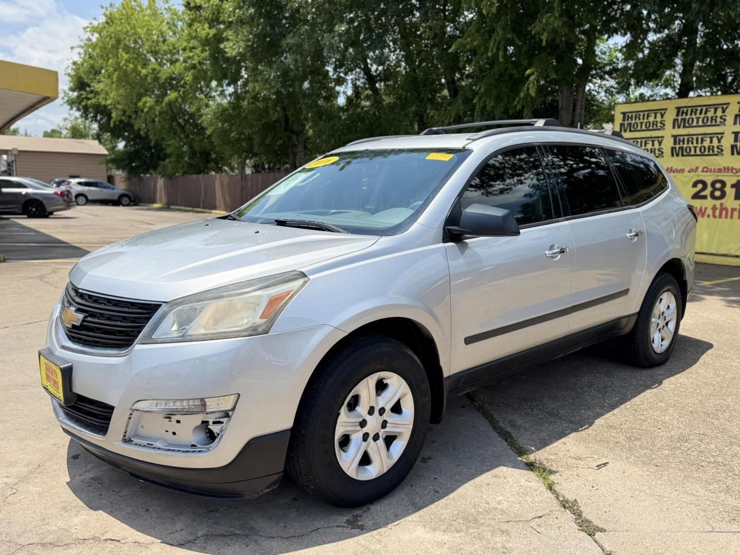2016 Silver /Gray Chevrolet Traverse LS FWD (1GNKRFKD4GJ) with an 3.6L V6 DOHC 24V engine, 6A transmission, located at 16710 Clay Rd., Houston, TX, 77084, (281) 859-7900, 29.834864, -95.656166 - Photo#1