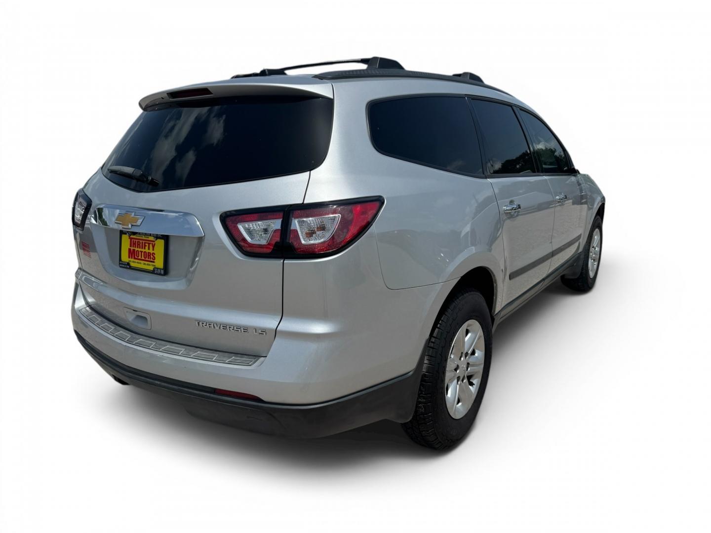 2016 Silver /Gray Chevrolet Traverse LS FWD (1GNKRFKD4GJ) with an 3.6L V6 DOHC 24V engine, 6A transmission, located at 16710 Clay Rd., Houston, TX, 77084, (281) 859-7900, 29.834864, -95.656166- Photo#2