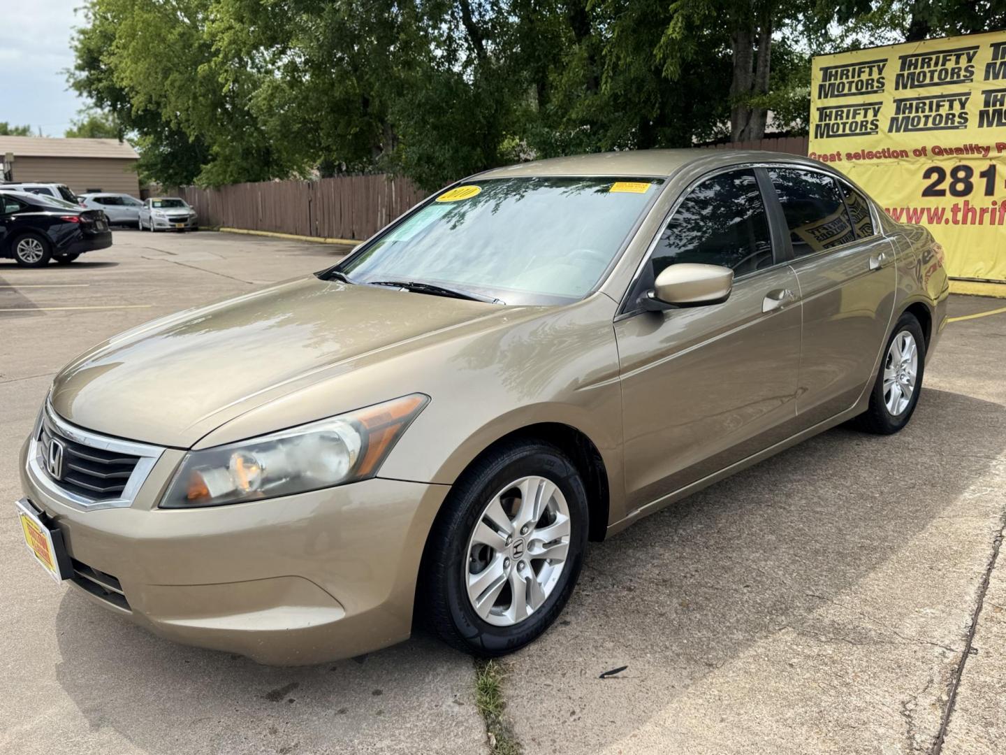 2010 Gold /Tan Honda Accord LX-P Sedan AT (1HGCP2F48AA) with an 2.4L L4 DOHC 16V engine, 5-Speed Automatic transmission, located at 16710 Clay Rd., Houston, TX, 77084, (281) 859-7900, 29.834864, -95.656166 - Photo#1