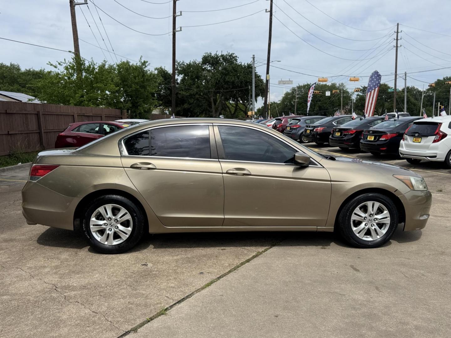 2010 Gold /Tan Honda Accord LX-P Sedan AT (1HGCP2F48AA) with an 2.4L L4 DOHC 16V engine, 5-Speed Automatic transmission, located at 16710 Clay Rd., Houston, TX, 77084, (281) 859-7900, 29.834864, -95.656166 - Photo#3