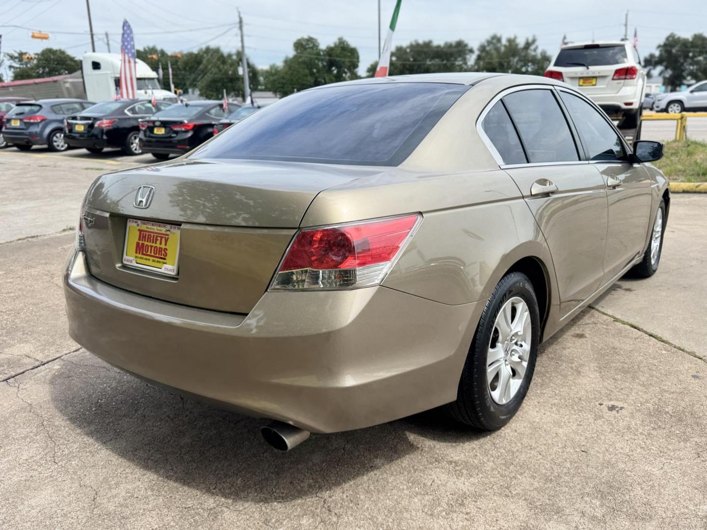 2010 Gold /Tan Honda Accord LX-P Sedan AT (1HGCP2F48AA) with an 2.4L L4 DOHC 16V engine, 5-Speed Automatic transmission, located at 16710 Clay Rd., Houston, TX, 77084, (281) 859-7900, 29.834864, -95.656166 - Photo#4