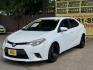2015 White /Tan Toyota Corolla L 4-Speed AT (2T1BURHE9FC) with an 1.8L L4 DOHC 16V engine, 4-Speed Automatic transmission, located at 16710 Clay Rd., Houston, TX, 77084, (281) 859-7900, 29.834864, -95.656166 - Photo#1