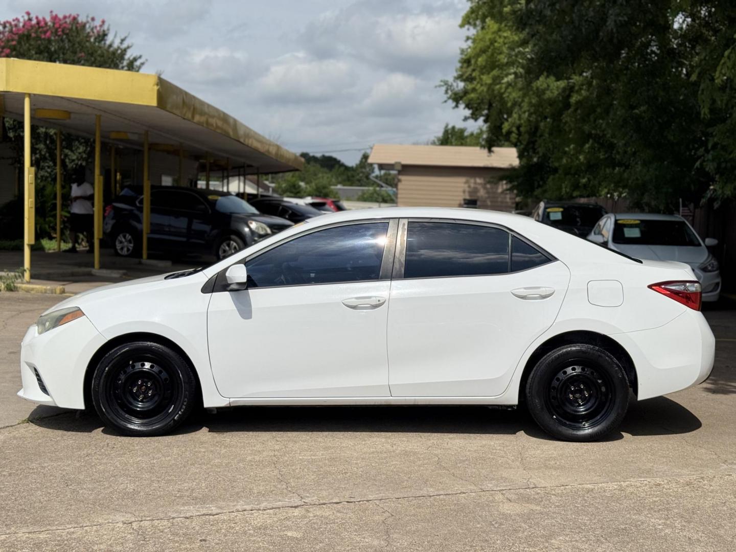 2015 White /Tan Toyota Corolla L 4-Speed AT (2T1BURHE9FC) with an 1.8L L4 DOHC 16V engine, 4-Speed Automatic transmission, located at 16710 Clay Rd., Houston, TX, 77084, (281) 859-7900, 29.834864, -95.656166 - Photo#6