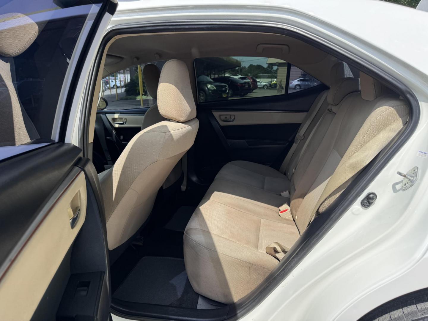 2015 White /Tan Toyota Corolla L 4-Speed AT (2T1BURHE9FC) with an 1.8L L4 DOHC 16V engine, 4-Speed Automatic transmission, located at 16710 Clay Rd., Houston, TX, 77084, (281) 859-7900, 29.834864, -95.656166 - Photo#9