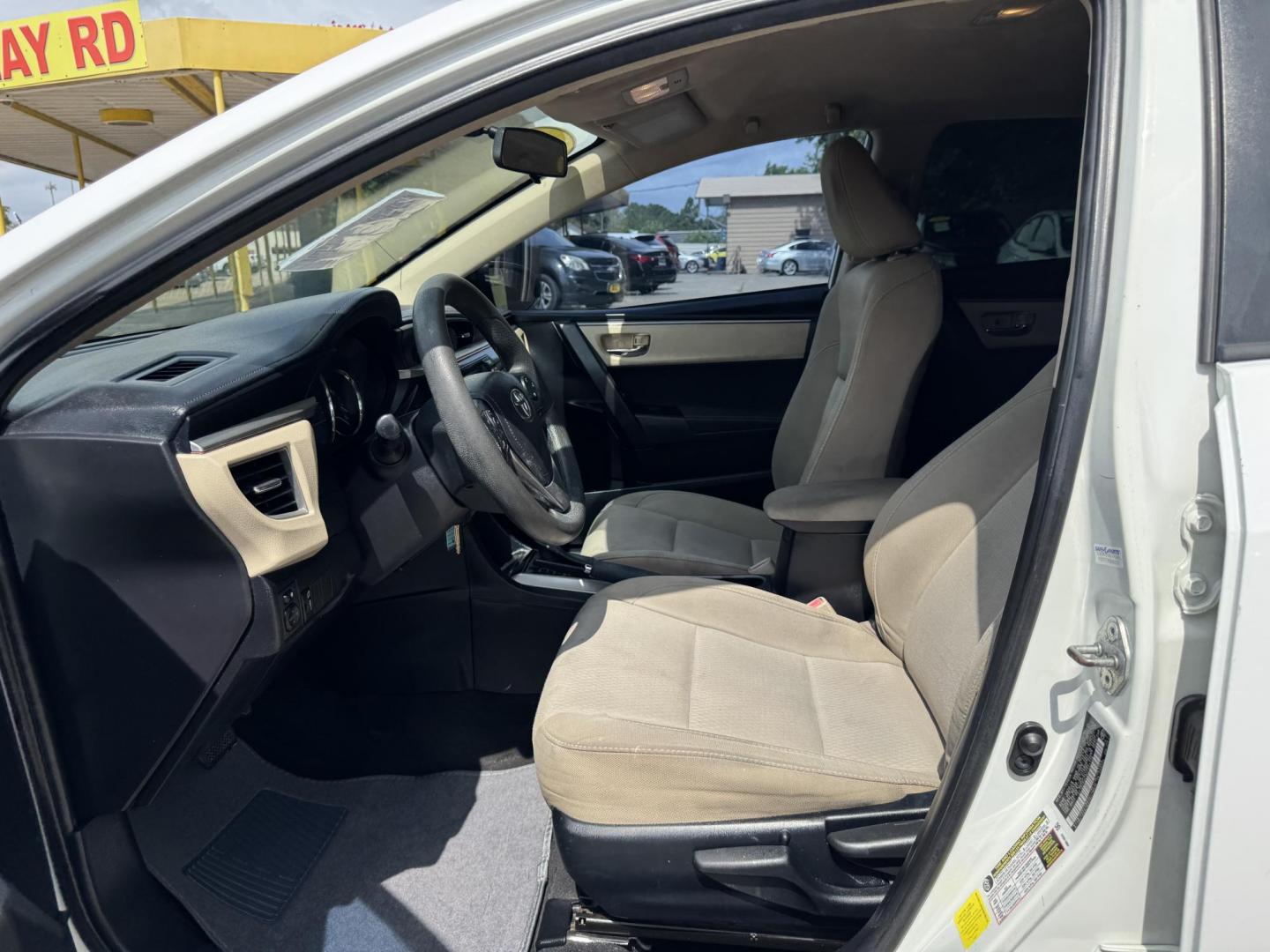2015 White /Tan Toyota Corolla L 4-Speed AT (2T1BURHE9FC) with an 1.8L L4 DOHC 16V engine, 4-Speed Automatic transmission, located at 16710 Clay Rd., Houston, TX, 77084, (281) 859-7900, 29.834864, -95.656166 - Photo#10