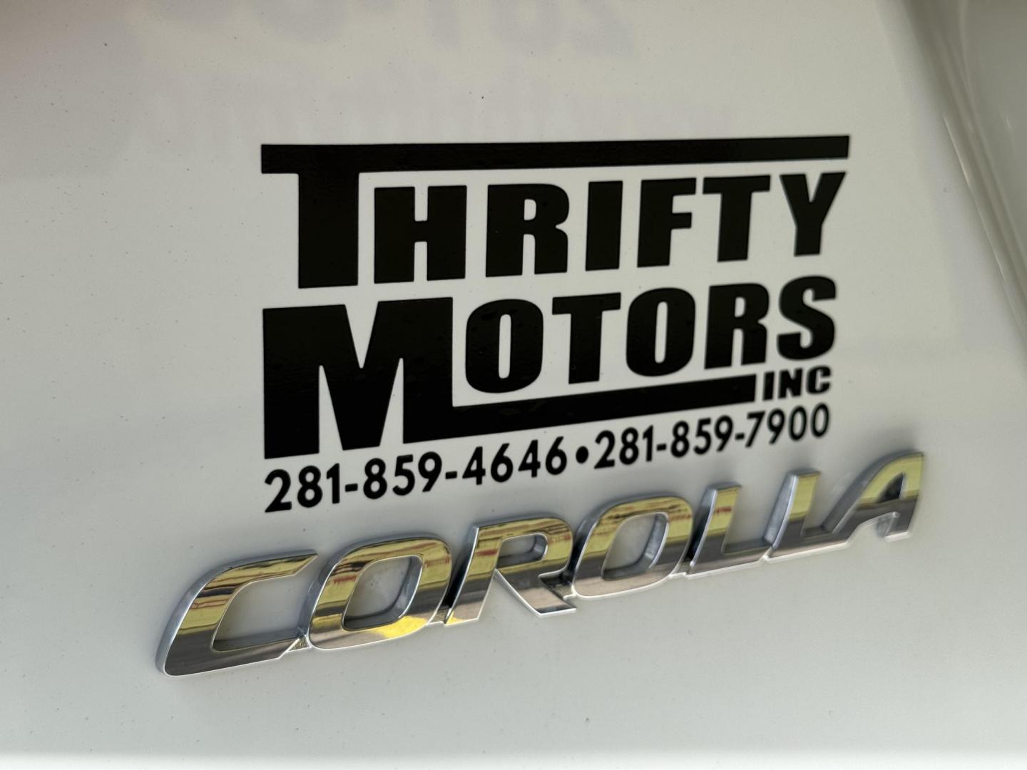 2015 White /Tan Toyota Corolla L 4-Speed AT (2T1BURHE9FC) with an 1.8L L4 DOHC 16V engine, 4-Speed Automatic transmission, located at 16710 Clay Rd., Houston, TX, 77084, (281) 859-7900, 29.834864, -95.656166 - Photo#14
