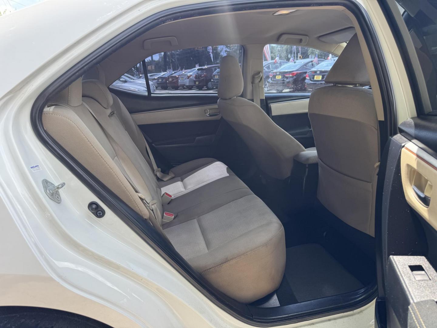 2015 White /Tan Toyota Corolla L 4-Speed AT (2T1BURHE9FC) with an 1.8L L4 DOHC 16V engine, 4-Speed Automatic transmission, located at 16710 Clay Rd., Houston, TX, 77084, (281) 859-7900, 29.834864, -95.656166 - Photo#13