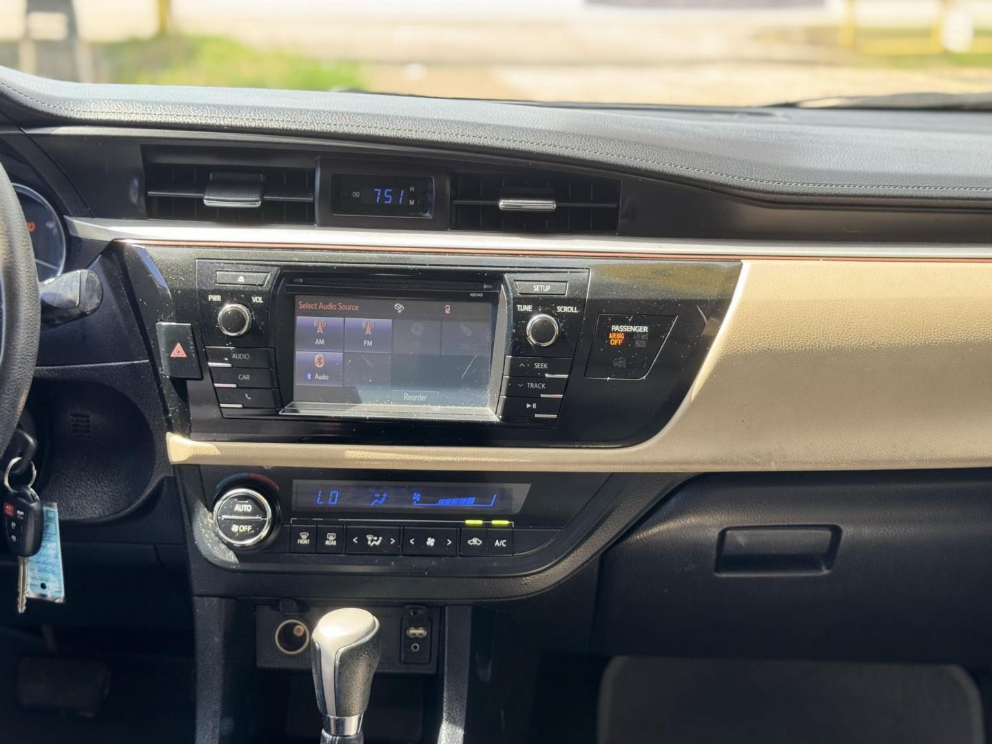 2015 White /Tan Toyota Corolla L 4-Speed AT (2T1BURHE9FC) with an 1.8L L4 DOHC 16V engine, 4-Speed Automatic transmission, located at 16710 Clay Rd., Houston, TX, 77084, (281) 859-7900, 29.834864, -95.656166 - Photo#16
