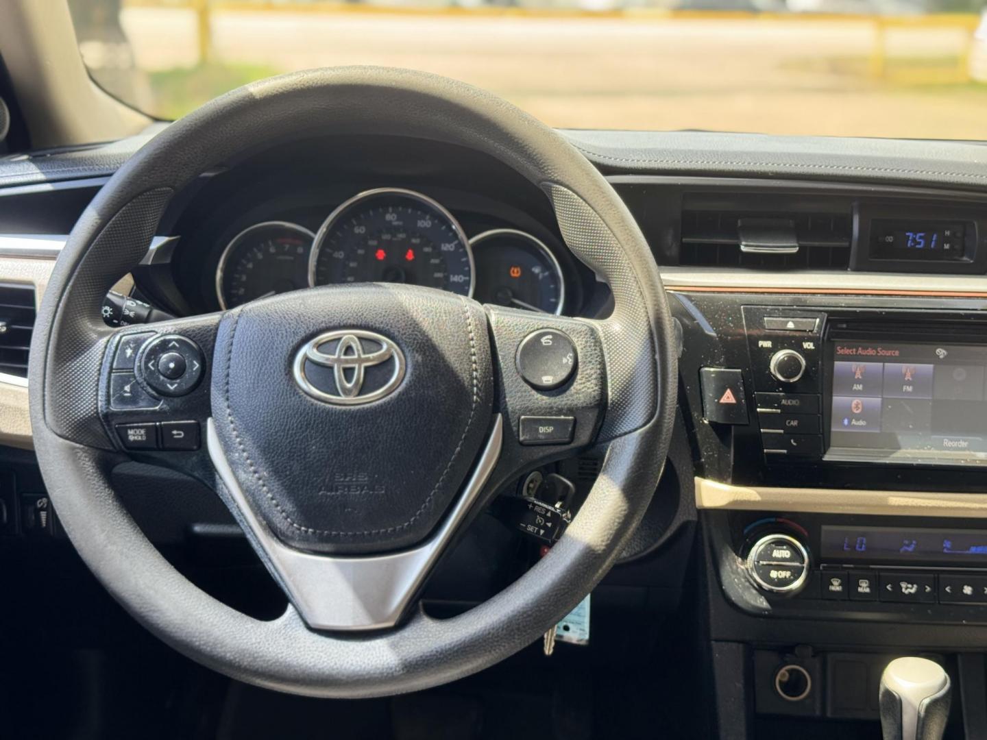 2015 White /Tan Toyota Corolla L 4-Speed AT (2T1BURHE9FC) with an 1.8L L4 DOHC 16V engine, 4-Speed Automatic transmission, located at 16710 Clay Rd., Houston, TX, 77084, (281) 859-7900, 29.834864, -95.656166 - Photo#17