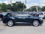 2015 Blue /Black Toyota Venza LE I4 AWD (4T3BA3BB6FU) with an 2.7L L4 DOHC 16V engine, 6-Speed Automatic transmission, located at 16710 Clay Rd., Houston, TX, 77084, (281) 859-7900, 29.834864, -95.656166 - Photo#2