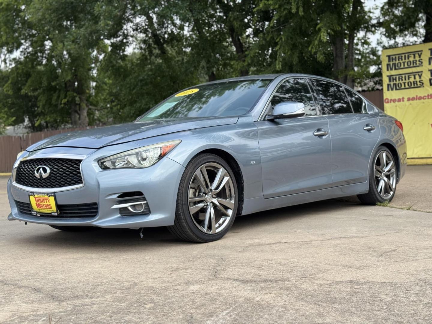 2015 Blue /Black Infiniti Q50 Premium (JN1BV7APXFM) with an 3.7L V6 DOHC 24V HYBRID engine, 7-Speed Automatic transmission, located at 16710 Clay Rd., Houston, TX, 77084, (281) 859-7900, 29.834864, -95.656166 - Photo#1