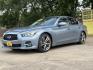 2015 Blue /Black Infiniti Q50 Premium (JN1BV7APXFM) with an 3.7L V6 DOHC 24V HYBRID engine, 7-Speed Automatic transmission, located at 16710 Clay Rd., Houston, TX, 77084, (281) 859-7900, 29.834864, -95.656166 - Photo#1