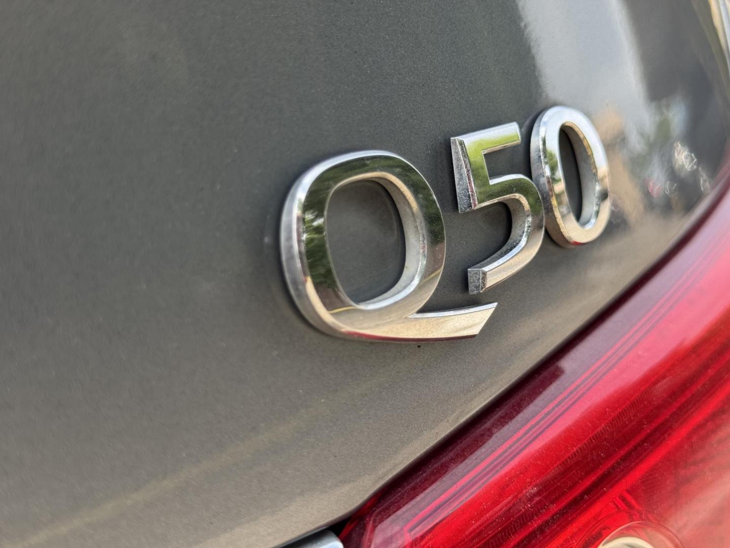 2015 Blue /Black Infiniti Q50 Premium (JN1BV7APXFM) with an 3.7L V6 DOHC 24V HYBRID engine, 7-Speed Automatic transmission, located at 16710 Clay Rd., Houston, TX, 77084, (281) 859-7900, 29.834864, -95.656166 - Photo#8