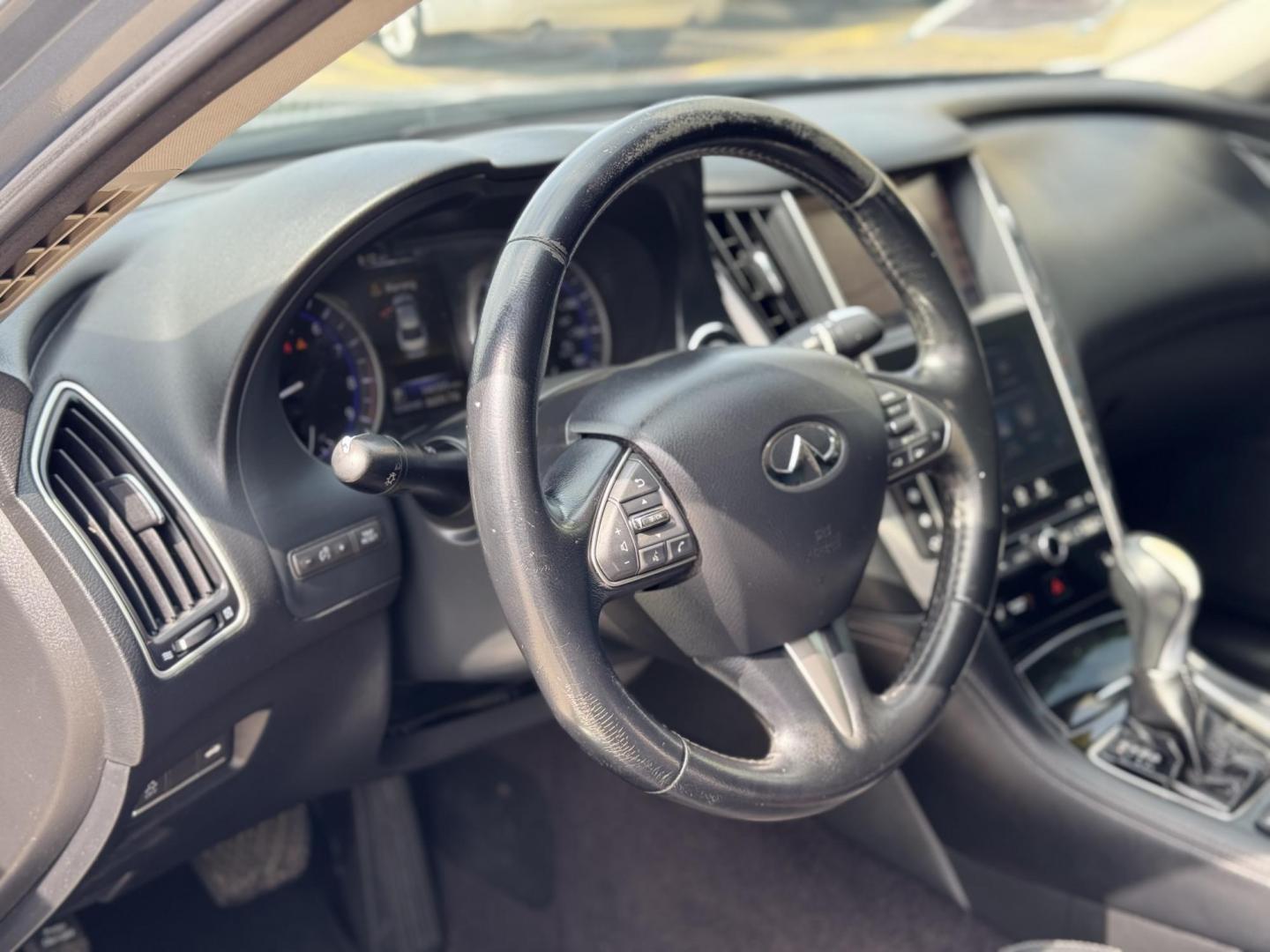 2015 Blue /Black Infiniti Q50 Premium (JN1BV7APXFM) with an 3.7L V6 DOHC 24V HYBRID engine, 7-Speed Automatic transmission, located at 16710 Clay Rd., Houston, TX, 77084, (281) 859-7900, 29.834864, -95.656166 - Photo#11