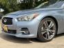 2015 Blue /Black Infiniti Q50 Premium (JN1BV7APXFM) with an 3.7L V6 DOHC 24V HYBRID engine, 7-Speed Automatic transmission, located at 16710 Clay Rd., Houston, TX, 77084, (281) 859-7900, 29.834864, -95.656166 - Photo#12