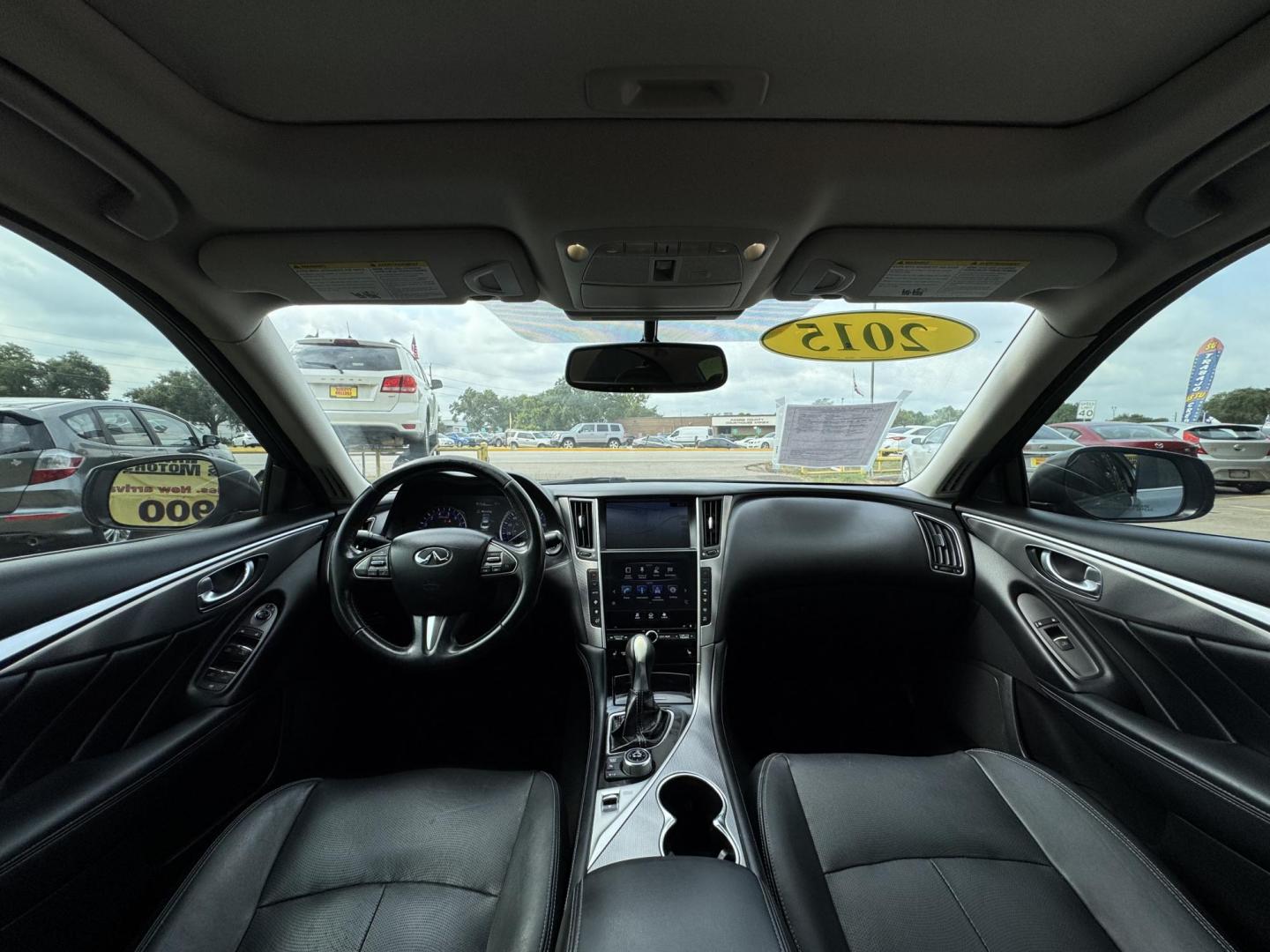 2015 Blue /Black Infiniti Q50 Premium (JN1BV7APXFM) with an 3.7L V6 DOHC 24V HYBRID engine, 7-Speed Automatic transmission, located at 16710 Clay Rd., Houston, TX, 77084, (281) 859-7900, 29.834864, -95.656166 - Photo#16