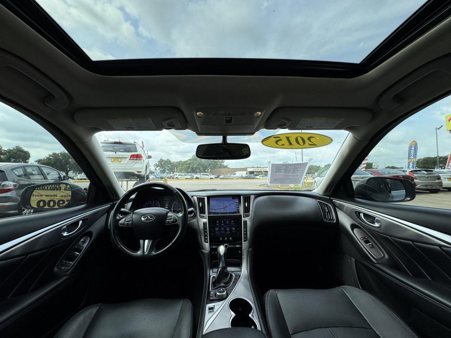 2015 Blue /Black Infiniti Q50 Premium (JN1BV7APXFM) with an 3.7L V6 DOHC 24V HYBRID engine, 7-Speed Automatic transmission, located at 16710 Clay Rd., Houston, TX, 77084, (281) 859-7900, 29.834864, -95.656166 - Photo#21