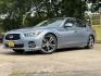 2015 Blue /Black Infiniti Q50 Premium (JN1BV7APXFM) with an 3.7L V6 DOHC 24V HYBRID engine, 7-Speed Automatic transmission, located at 16710 Clay Rd., Houston, TX, 77084, (281) 859-7900, 29.834864, -95.656166 - Photo#22