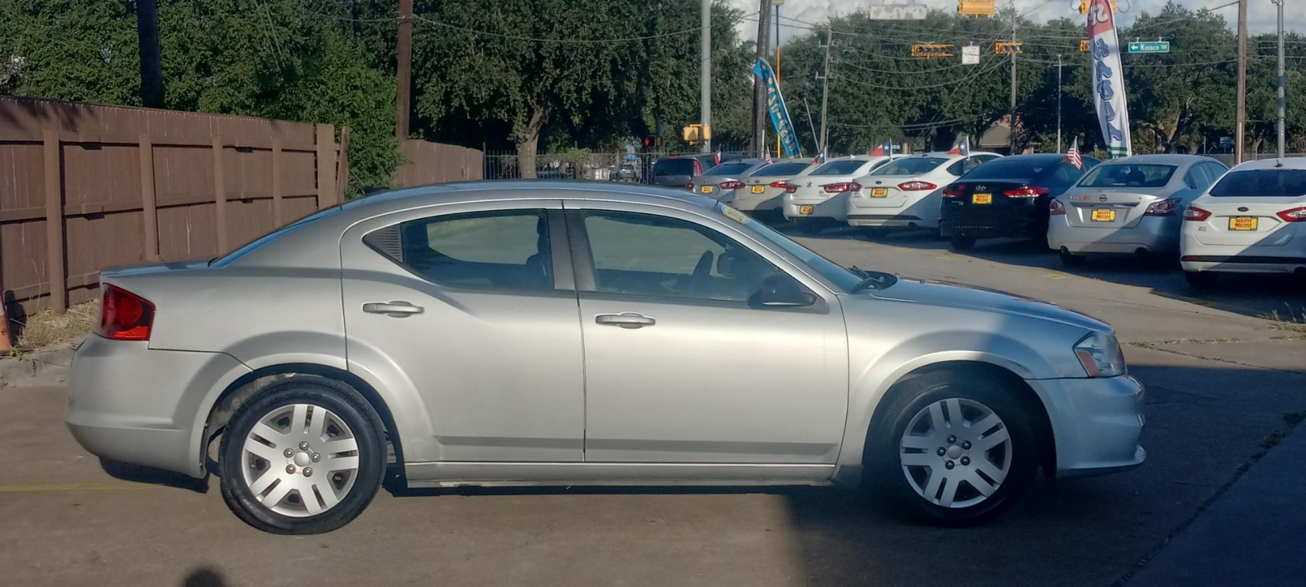 2012 Silver Dodge Avenger (1C3CDZAB4CN) with an 2.4L I4 2.4L I4 engine, Automatic 4-Speed transmission, located at 16710 Clay Rd., Houston, TX, 77084, (281) 859-7900, 29.834864, -95.656166 - Low Down. Low Payments. - Photo #4