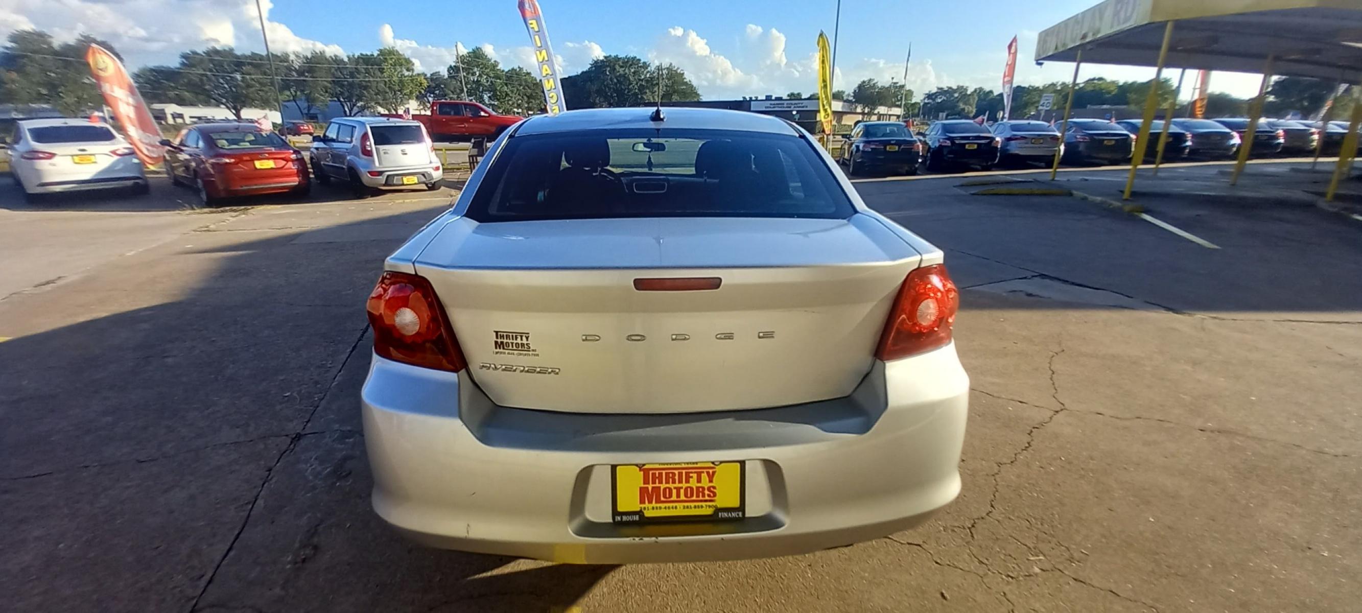 2012 Silver Dodge Avenger (1C3CDZAB4CN) with an 2.4L I4 2.4L I4 engine, Automatic 4-Speed transmission, located at 16710 Clay Rd., Houston, TX, 77084, (281) 859-7900, 29.834864, -95.656166 - Low Down. Low Payments. - Photo #5