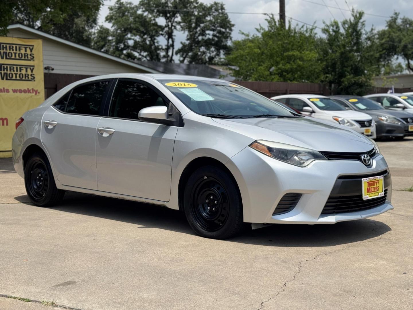 2015 Silver /Gray Toyota Corolla L 4-Speed AT (5YFBURHEXFP) with an 1.8L L4 DOHC 16V engine, 4-Speed Automatic transmission, located at 16710 Clay Rd., Houston, TX, 77084, (281) 859-7900, 29.834864, -95.656166 - Photo#2