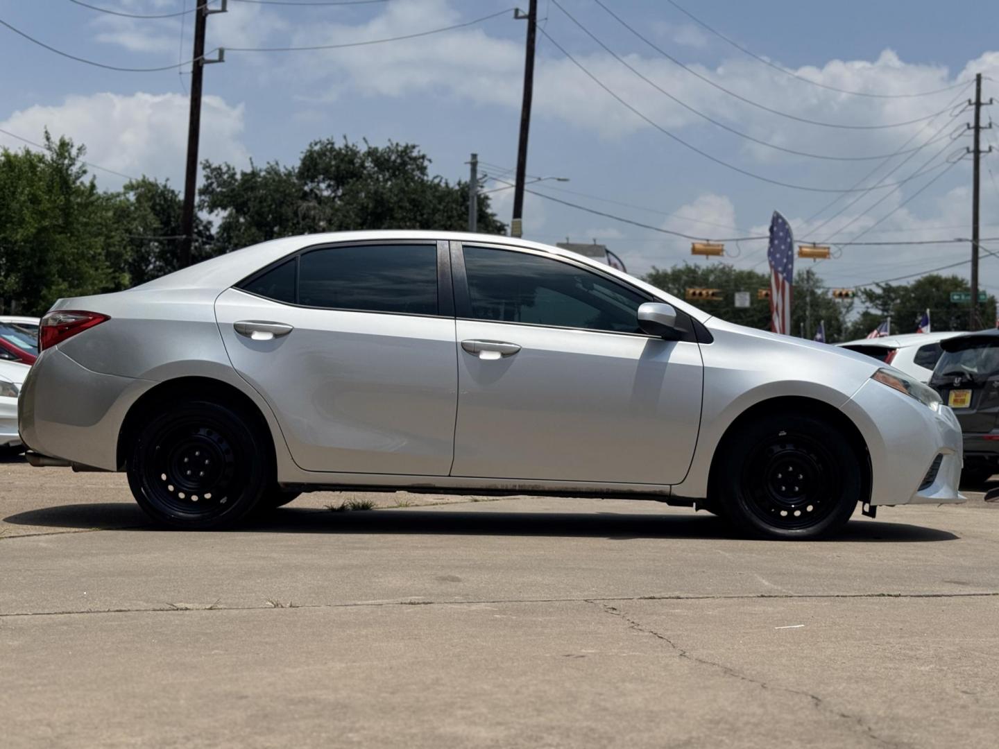2015 Silver /Gray Toyota Corolla L 4-Speed AT (5YFBURHEXFP) with an 1.8L L4 DOHC 16V engine, 4-Speed Automatic transmission, located at 16710 Clay Rd., Houston, TX, 77084, (281) 859-7900, 29.834864, -95.656166 - Photo#3