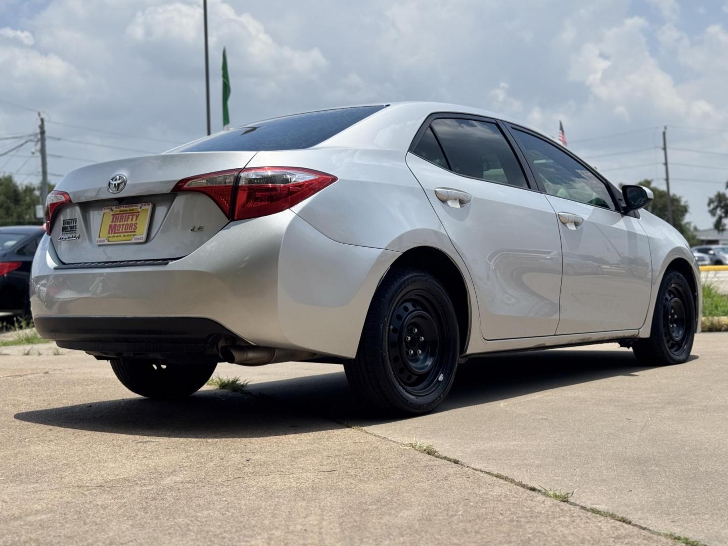 2015 Silver /Gray Toyota Corolla L 4-Speed AT (5YFBURHEXFP) with an 1.8L L4 DOHC 16V engine, 4-Speed Automatic transmission, located at 16710 Clay Rd., Houston, TX, 77084, (281) 859-7900, 29.834864, -95.656166 - Photo#4