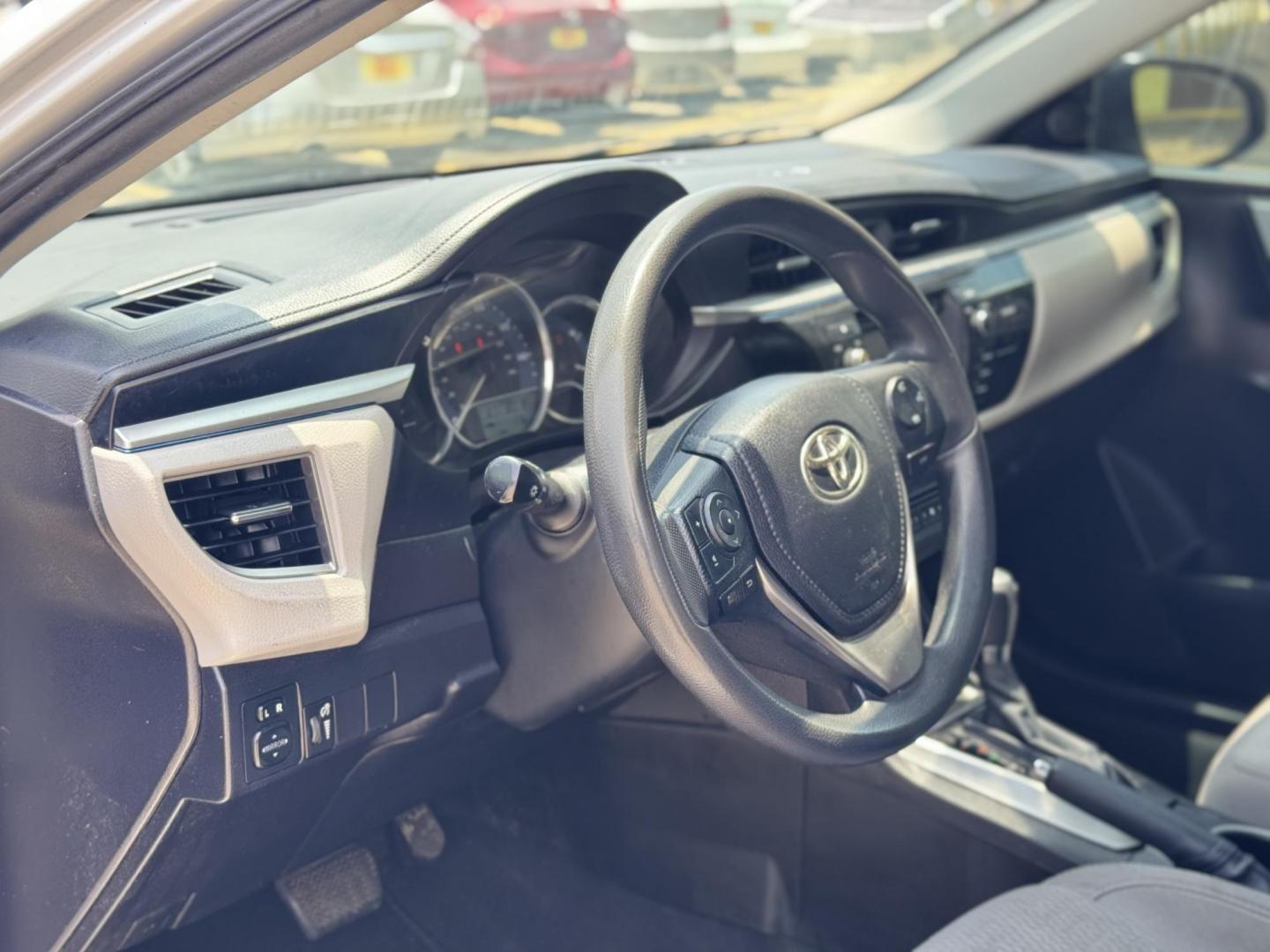 2015 Silver /Gray Toyota Corolla L 4-Speed AT (5YFBURHEXFP) with an 1.8L L4 DOHC 16V engine, 4-Speed Automatic transmission, located at 16710 Clay Rd., Houston, TX, 77084, (281) 859-7900, 29.834864, -95.656166 - Photo#7