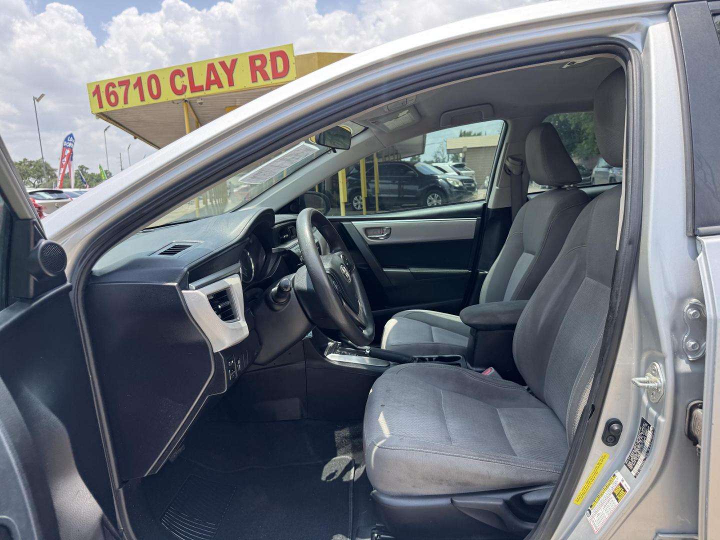 2015 Silver /Gray Toyota Corolla L 4-Speed AT (5YFBURHEXFP) with an 1.8L L4 DOHC 16V engine, 4-Speed Automatic transmission, located at 16710 Clay Rd., Houston, TX, 77084, (281) 859-7900, 29.834864, -95.656166 - Photo#8