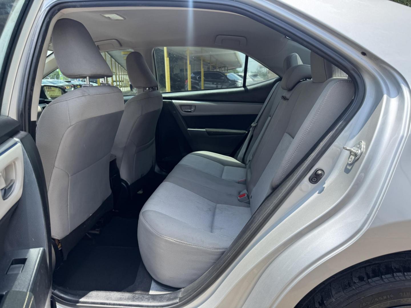 2015 Silver /Gray Toyota Corolla L 4-Speed AT (5YFBURHEXFP) with an 1.8L L4 DOHC 16V engine, 4-Speed Automatic transmission, located at 16710 Clay Rd., Houston, TX, 77084, (281) 859-7900, 29.834864, -95.656166 - Photo#9