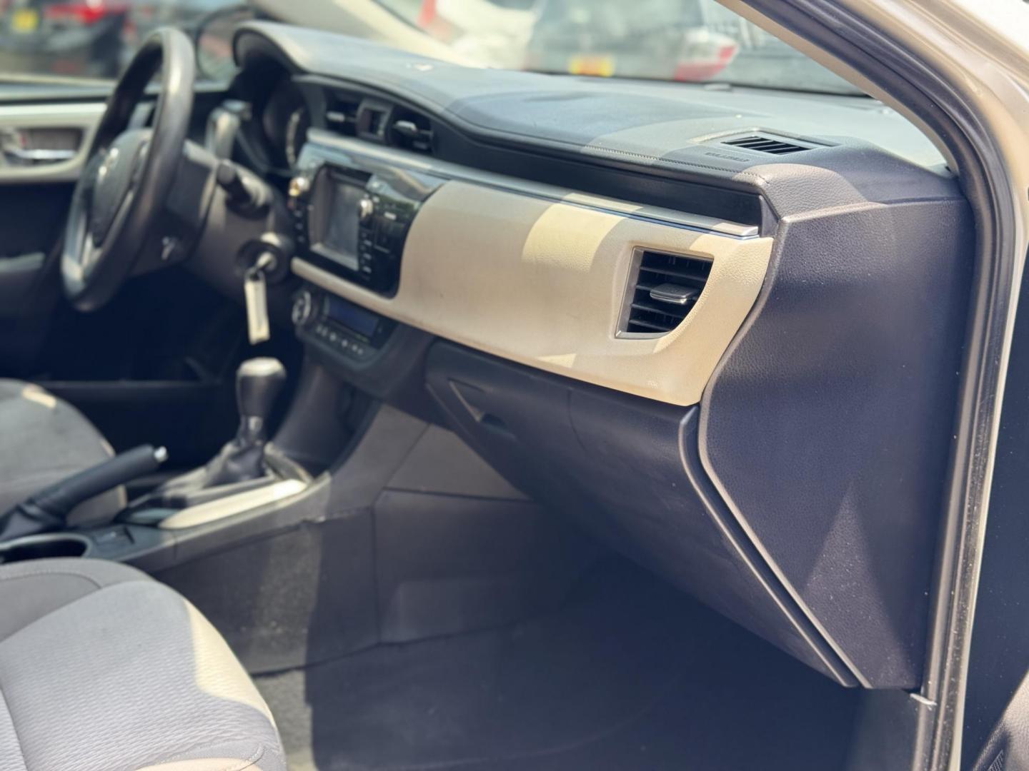 2015 Silver /Gray Toyota Corolla L 4-Speed AT (5YFBURHEXFP) with an 1.8L L4 DOHC 16V engine, 4-Speed Automatic transmission, located at 16710 Clay Rd., Houston, TX, 77084, (281) 859-7900, 29.834864, -95.656166 - Photo#13