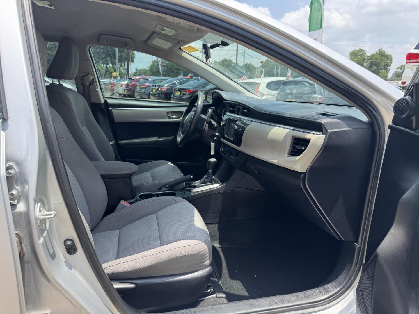 2015 Silver /Gray Toyota Corolla L 4-Speed AT (5YFBURHEXFP) with an 1.8L L4 DOHC 16V engine, 4-Speed Automatic transmission, located at 16710 Clay Rd., Houston, TX, 77084, (281) 859-7900, 29.834864, -95.656166 - Photo#12
