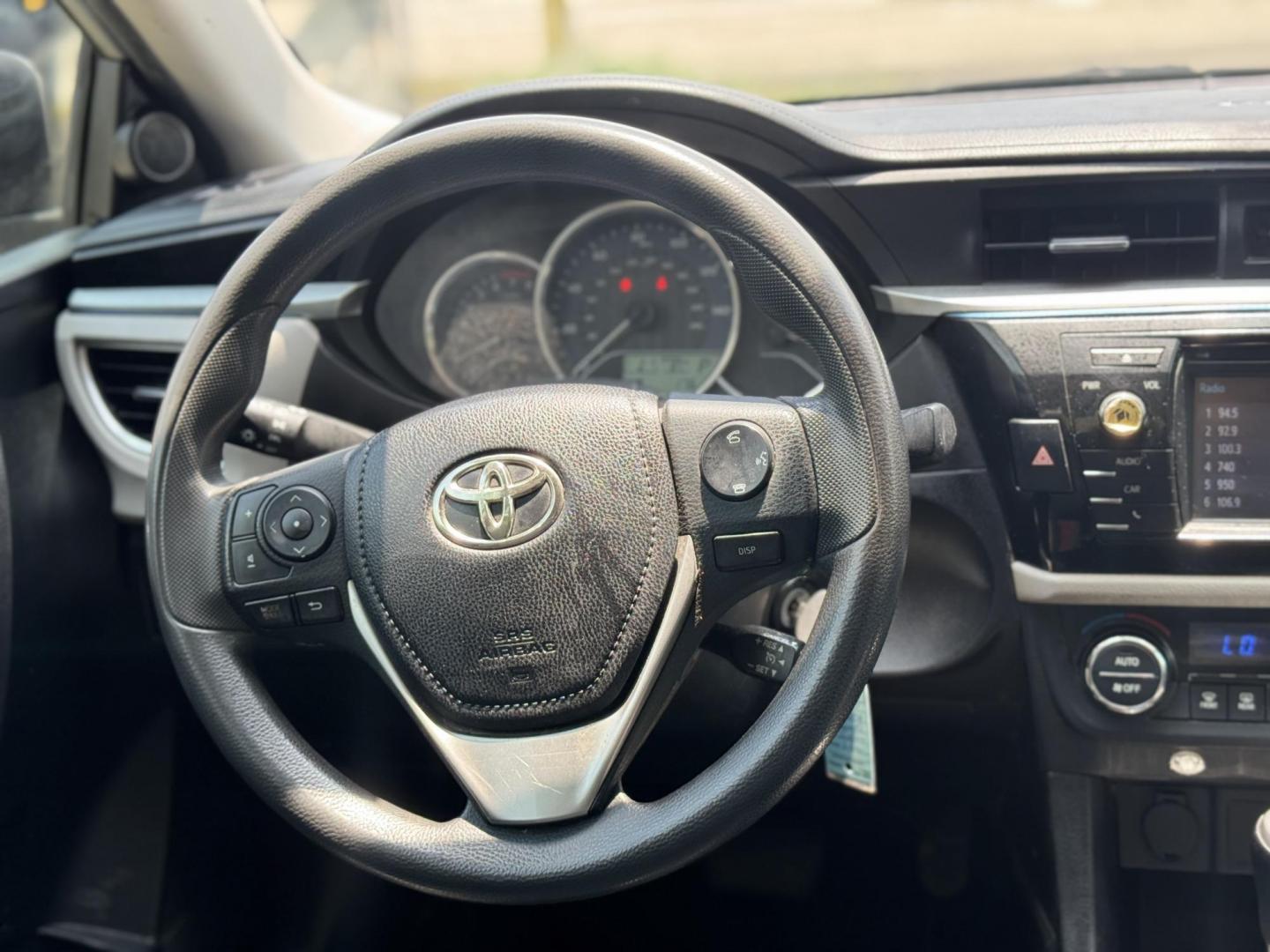 2015 Silver /Gray Toyota Corolla L 4-Speed AT (5YFBURHEXFP) with an 1.8L L4 DOHC 16V engine, 4-Speed Automatic transmission, located at 16710 Clay Rd., Houston, TX, 77084, (281) 859-7900, 29.834864, -95.656166 - Photo#14