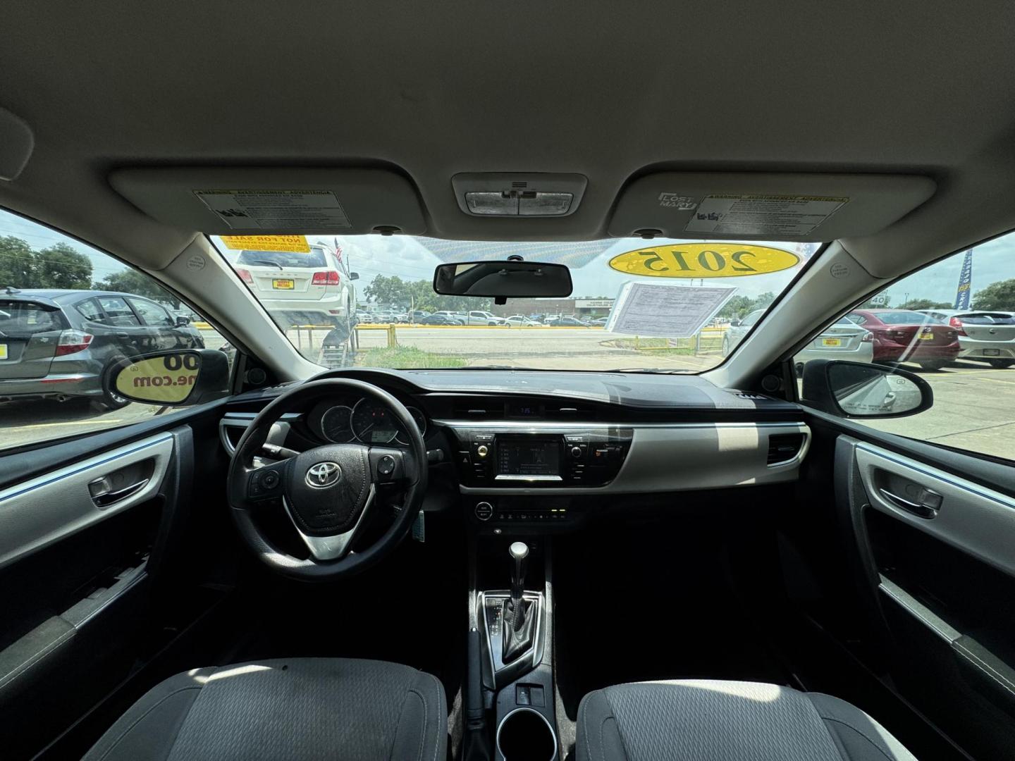 2015 Silver /Gray Toyota Corolla L 4-Speed AT (5YFBURHEXFP) with an 1.8L L4 DOHC 16V engine, 4-Speed Automatic transmission, located at 16710 Clay Rd., Houston, TX, 77084, (281) 859-7900, 29.834864, -95.656166 - Photo#15