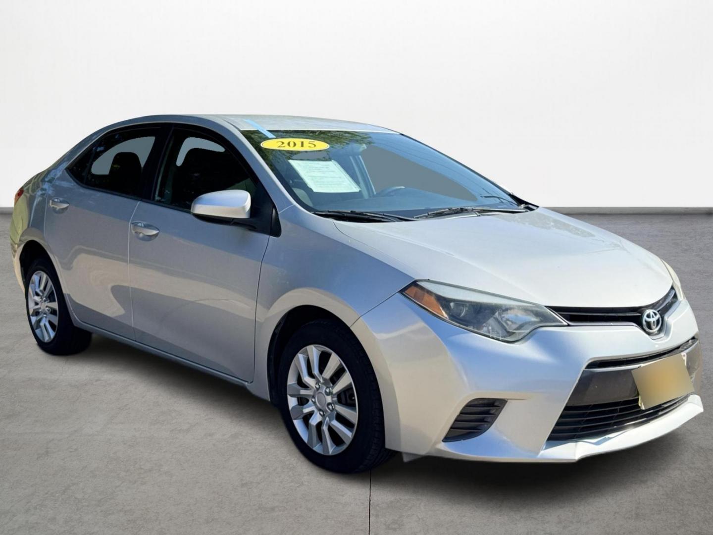 2015 Silver /Gray Toyota Corolla L 4-Speed AT (5YFBURHEXFP) with an 1.8L L4 DOHC 16V engine, 4-Speed Automatic transmission, located at 16710 Clay Rd., Houston, TX, 77084, (281) 859-7900, 29.834864, -95.656166 - Photo#2