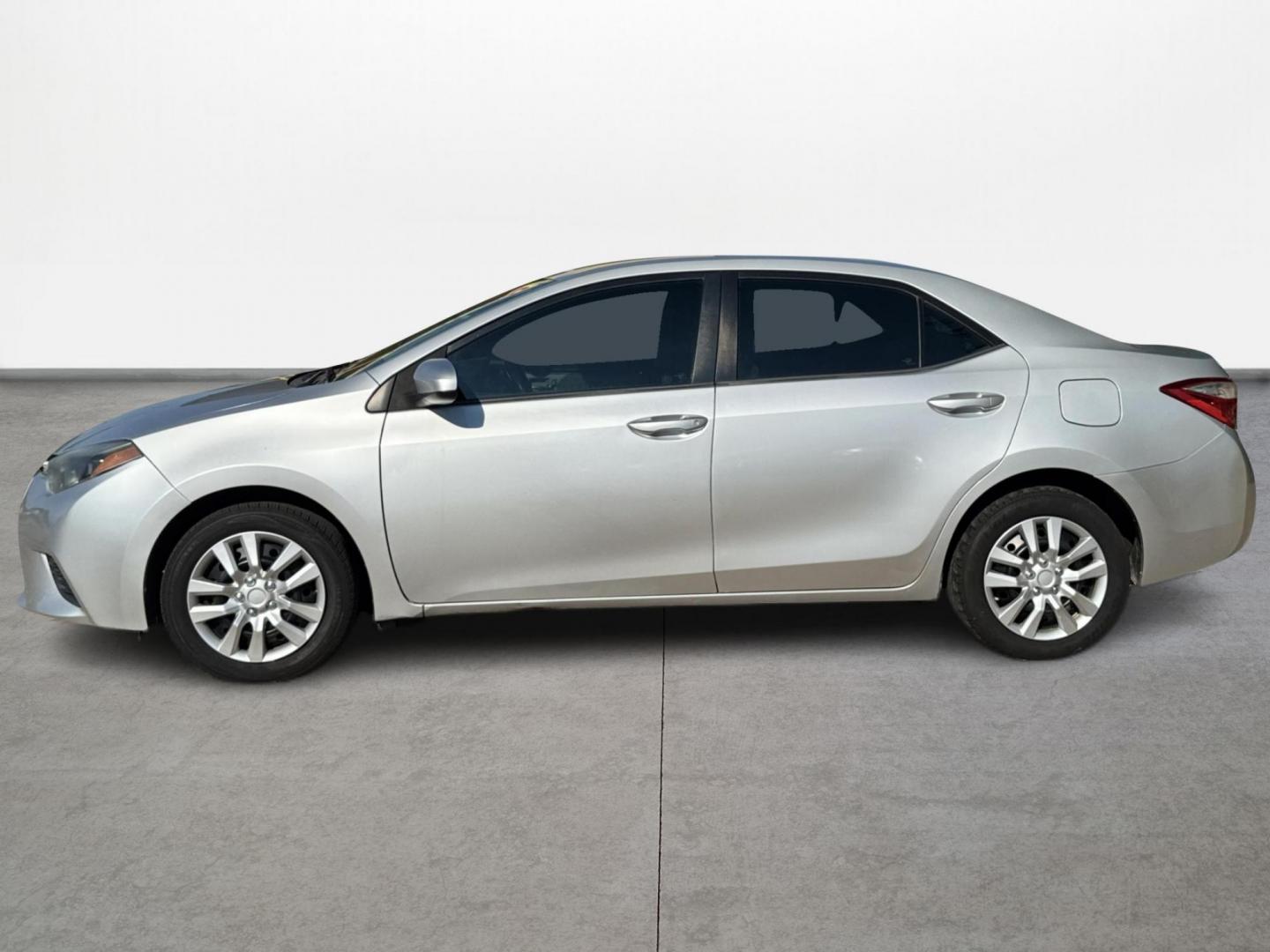2015 Silver /Gray Toyota Corolla L 4-Speed AT (5YFBURHEXFP) with an 1.8L L4 DOHC 16V engine, 4-Speed Automatic transmission, located at 16710 Clay Rd., Houston, TX, 77084, (281) 859-7900, 29.834864, -95.656166 - Photo#7