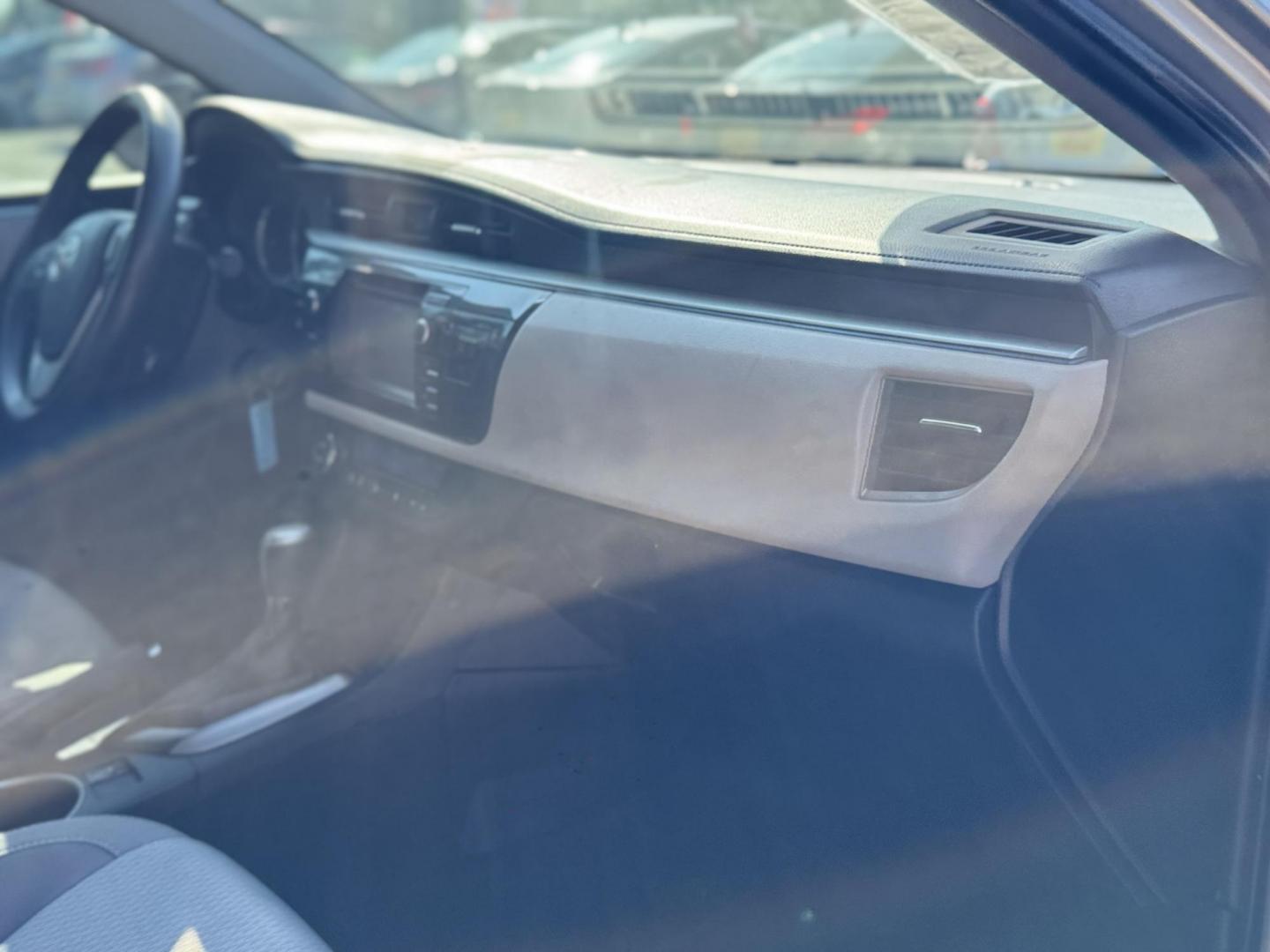 2015 Silver /Gray Toyota Corolla L 4-Speed AT (5YFBURHEXFP) with an 1.8L L4 DOHC 16V engine, 4-Speed Automatic transmission, located at 16710 Clay Rd., Houston, TX, 77084, (281) 859-7900, 29.834864, -95.656166 - Photo#10