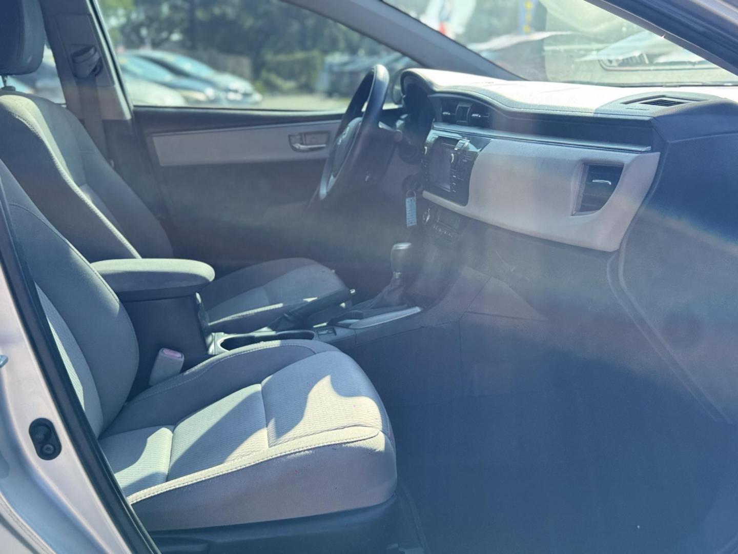 2015 Silver /Gray Toyota Corolla L 4-Speed AT (5YFBURHEXFP) with an 1.8L L4 DOHC 16V engine, 4-Speed Automatic transmission, located at 16710 Clay Rd., Houston, TX, 77084, (281) 859-7900, 29.834864, -95.656166 - Photo#11