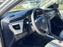 2015 Silver /Gray Toyota Corolla L 4-Speed AT (5YFBURHEXFP) with an 1.8L L4 DOHC 16V engine, 4-Speed Automatic transmission, located at 16710 Clay Rd., Houston, TX, 77084, (281) 859-7900, 29.834864, -95.656166 - Photo#16