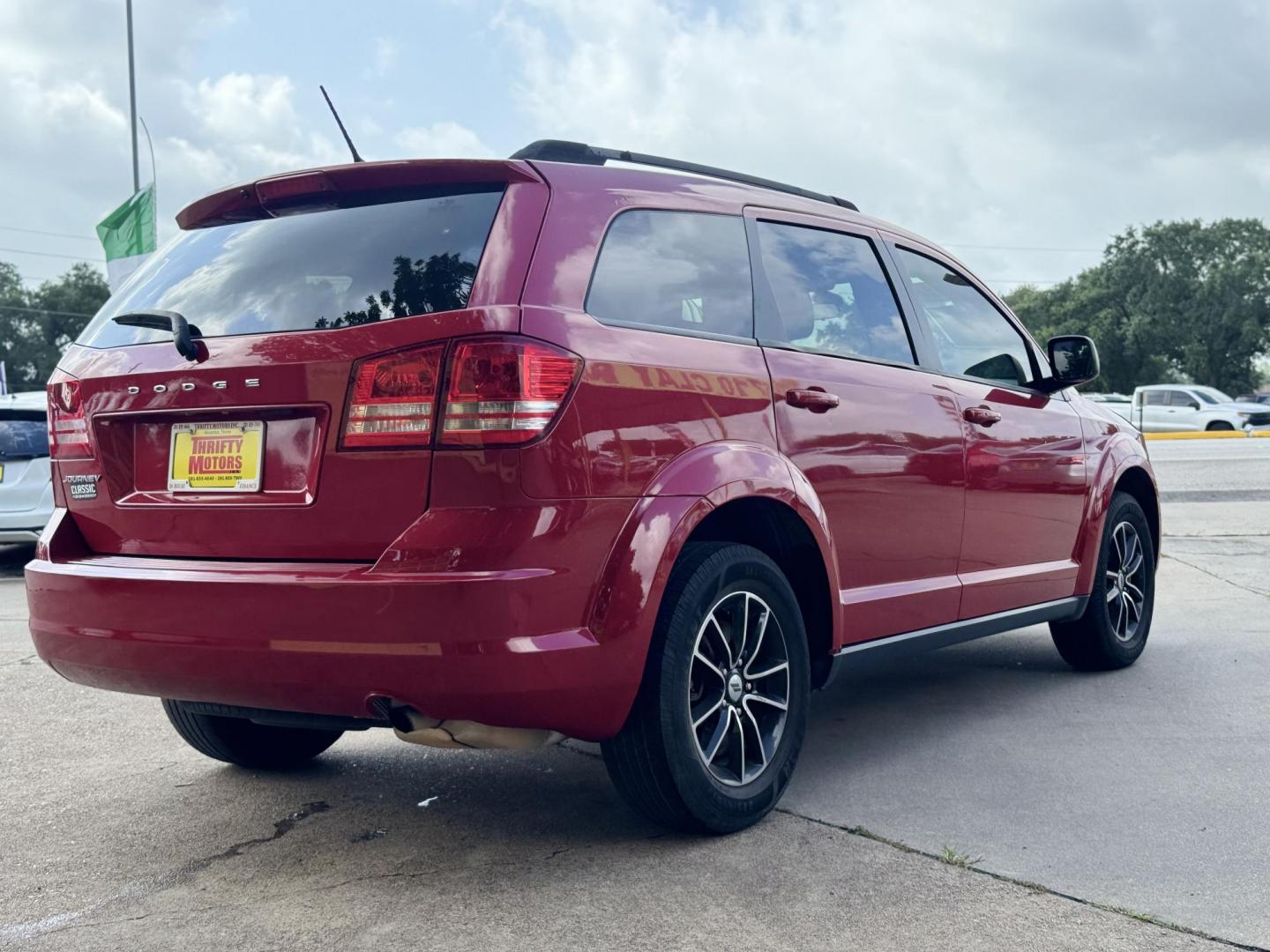 2018 Red Dodge Journey SE (3C4PDCAB5JT) with an 2.4L L4 DOHC 16V engine, 4A transmission, located at 16710 Clay Rd., Houston, TX, 77084, (281) 859-7900, 29.834864, -95.656166 - Photo#2