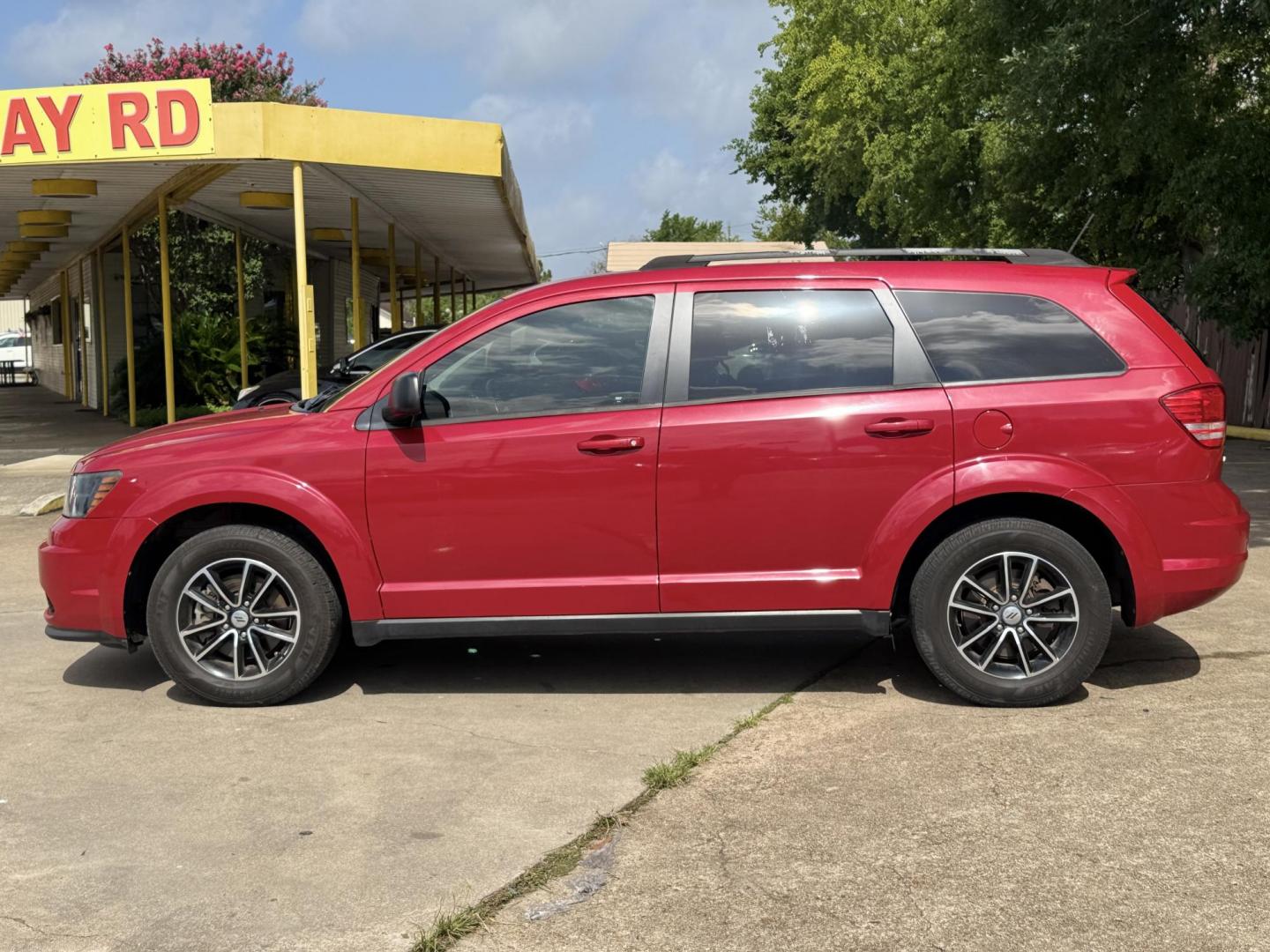 2018 Red Dodge Journey SE (3C4PDCAB5JT) with an 2.4L L4 DOHC 16V engine, 4A transmission, located at 16710 Clay Rd., Houston, TX, 77084, (281) 859-7900, 29.834864, -95.656166 - Photo#1