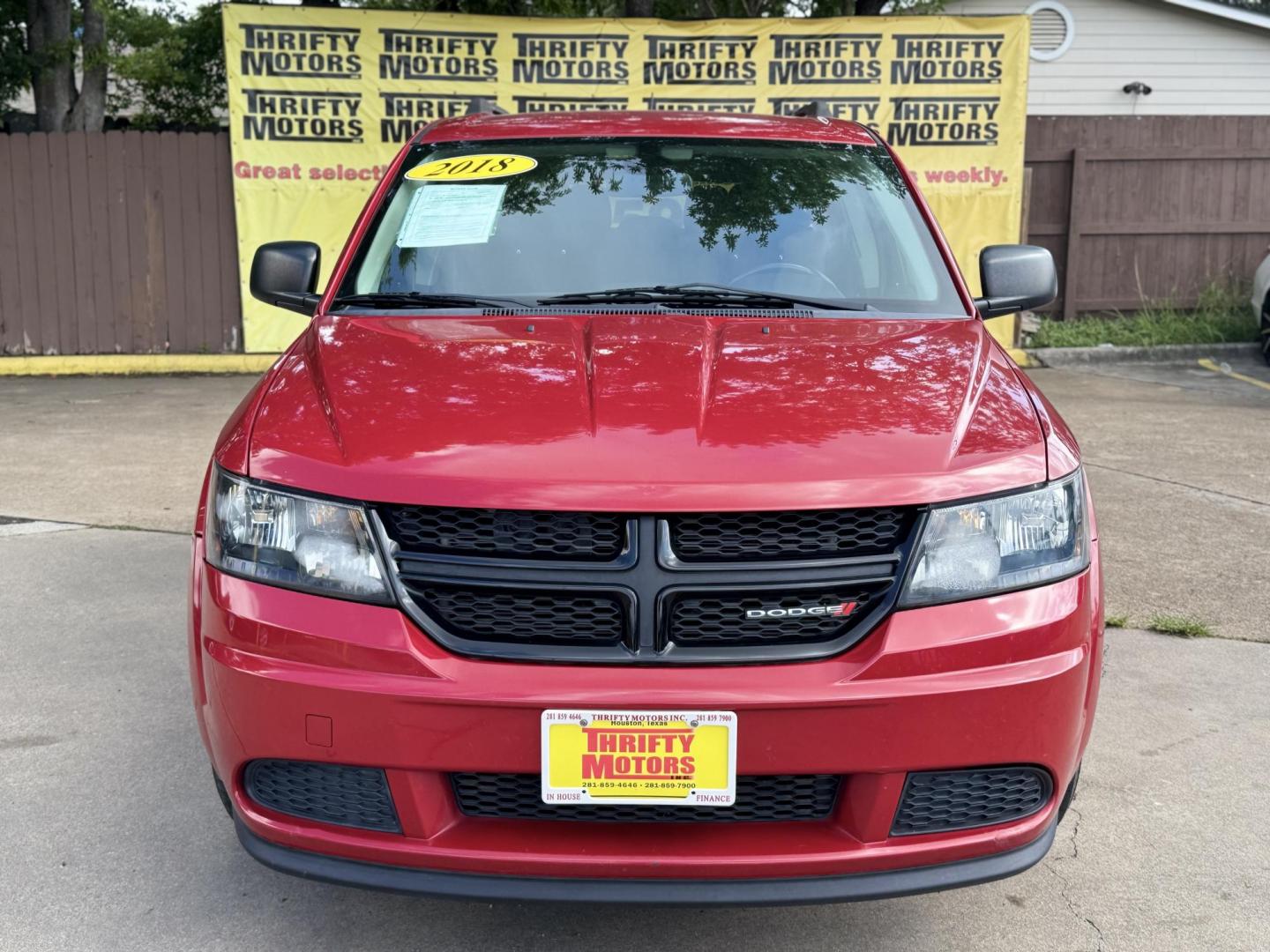 2018 Red Dodge Journey SE (3C4PDCAB5JT) with an 2.4L L4 DOHC 16V engine, 4A transmission, located at 16710 Clay Rd., Houston, TX, 77084, (281) 859-7900, 29.834864, -95.656166 - Photo#7