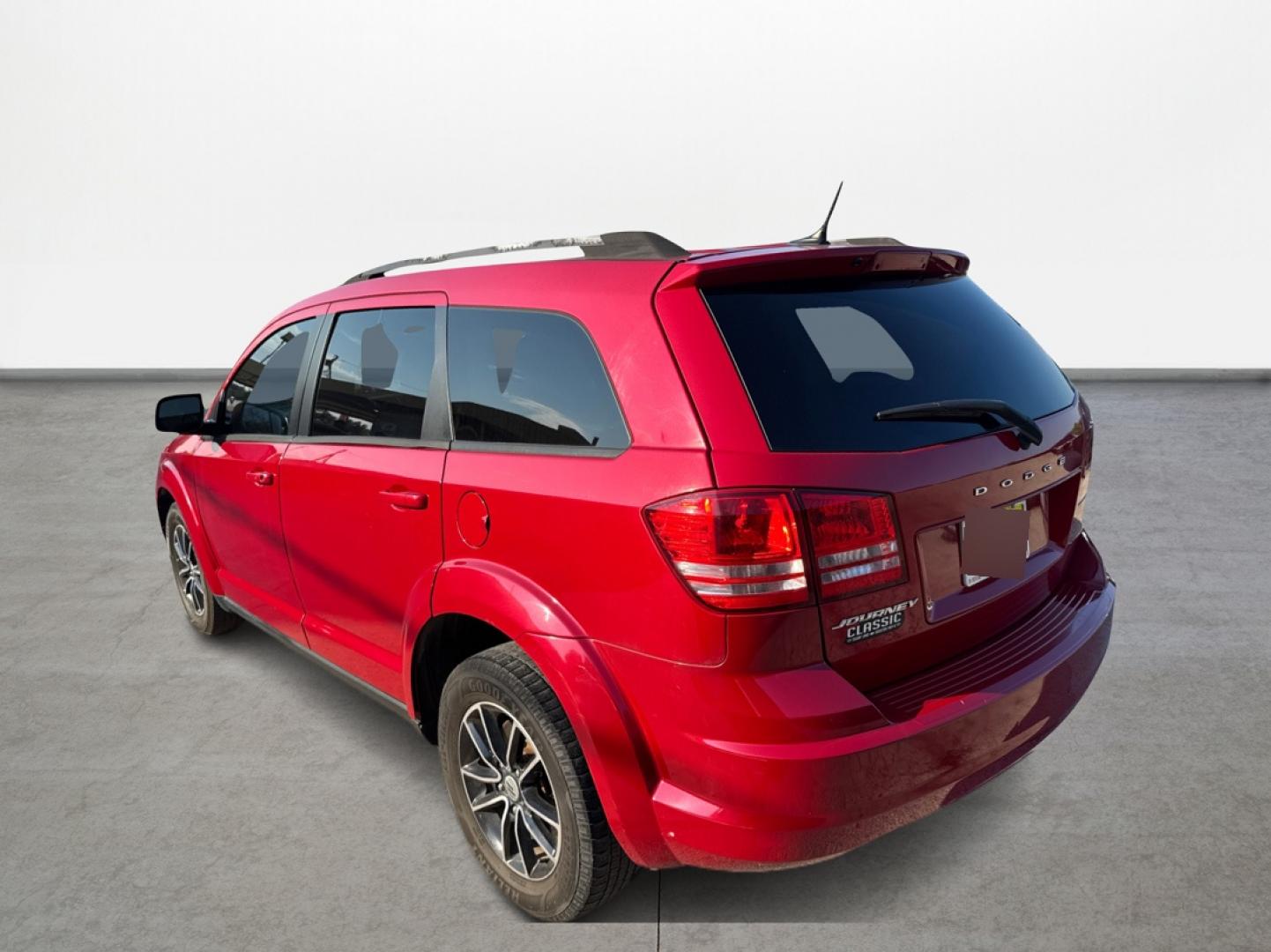2018 Red Dodge Journey SE (3C4PDCAB5JT) with an 2.4L L4 DOHC 16V engine, 4A transmission, located at 16710 Clay Rd., Houston, TX, 77084, (281) 859-7900, 29.834864, -95.656166 - Photo#6