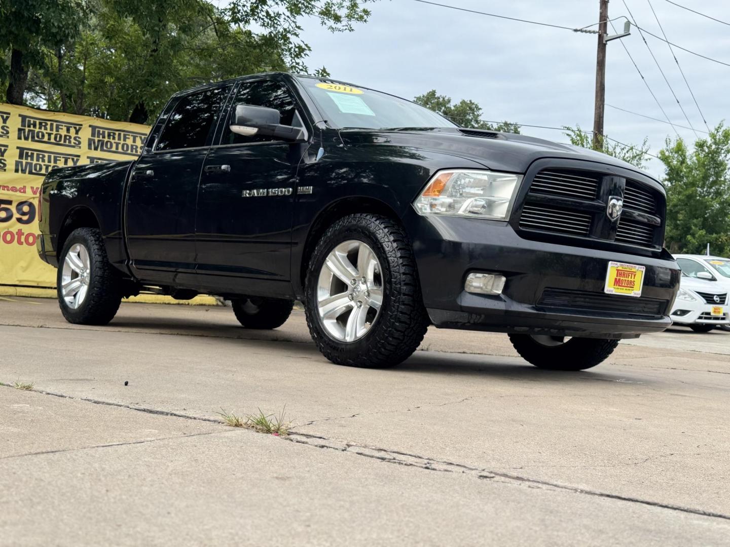 2011 Black Dodge Ram 1500 SLT Crew Cab 2WD (1D7RB1CT8BS) with an 5.7L V8 OHV 16V engine, 5-Speed Automatic transmission, located at 16710 Clay Rd., Houston, TX, 77084, (281) 859-7900, 29.834864, -95.656166 - Photo#8