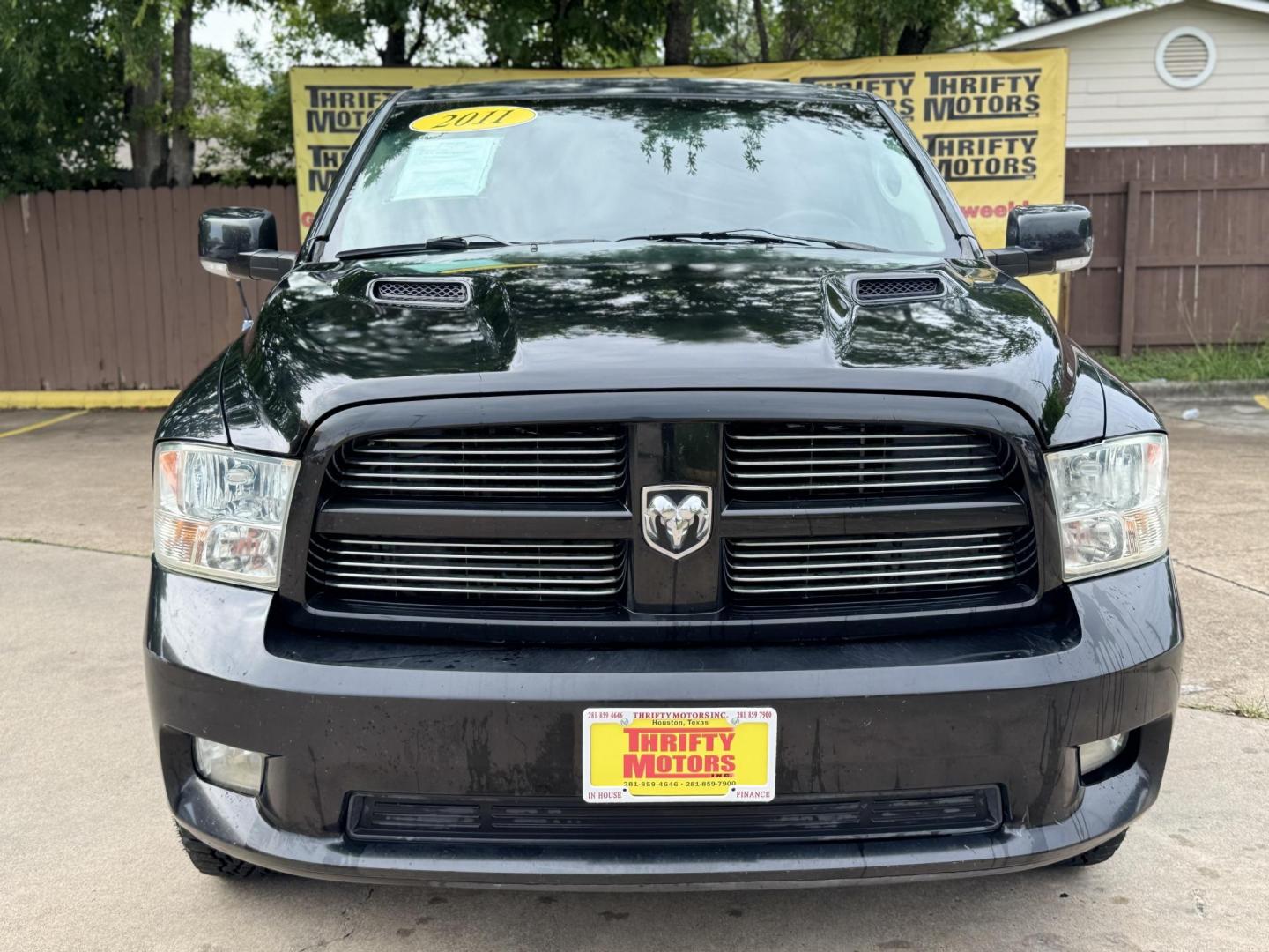 2011 Black Dodge Ram 1500 SLT Crew Cab 2WD (1D7RB1CT8BS) with an 5.7L V8 OHV 16V engine, 5-Speed Automatic transmission, located at 16710 Clay Rd., Houston, TX, 77084, (281) 859-7900, 29.834864, -95.656166 - Photo#9